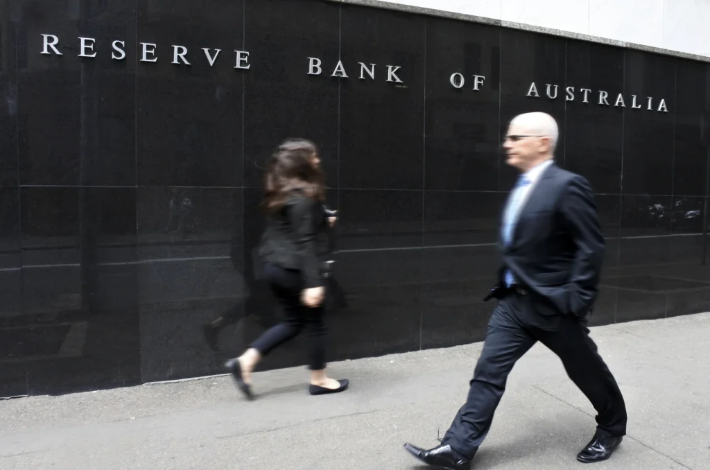 image of people walking past the reserve bank of australia building