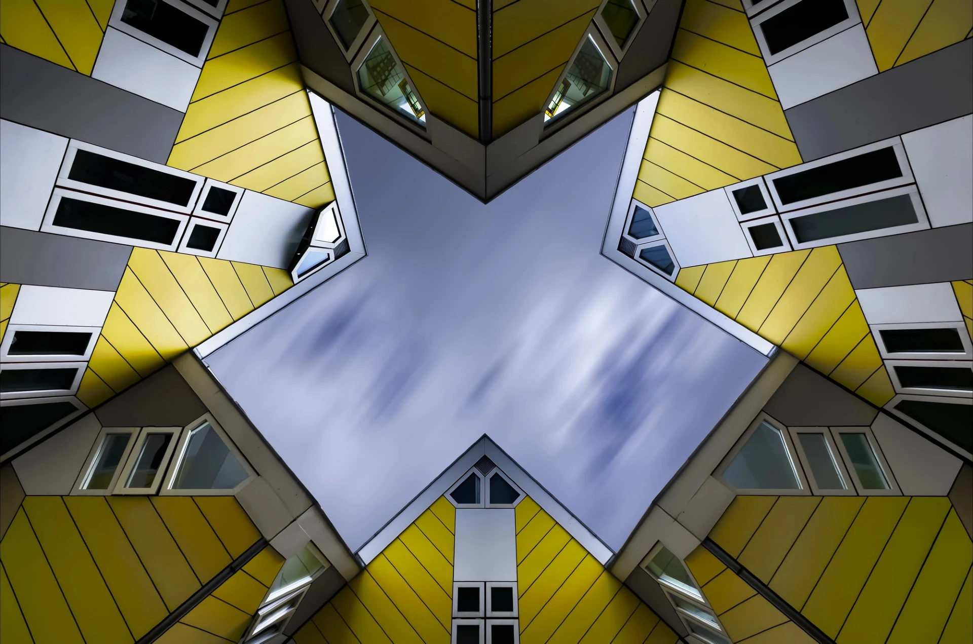 yellow apartments with blue sky background